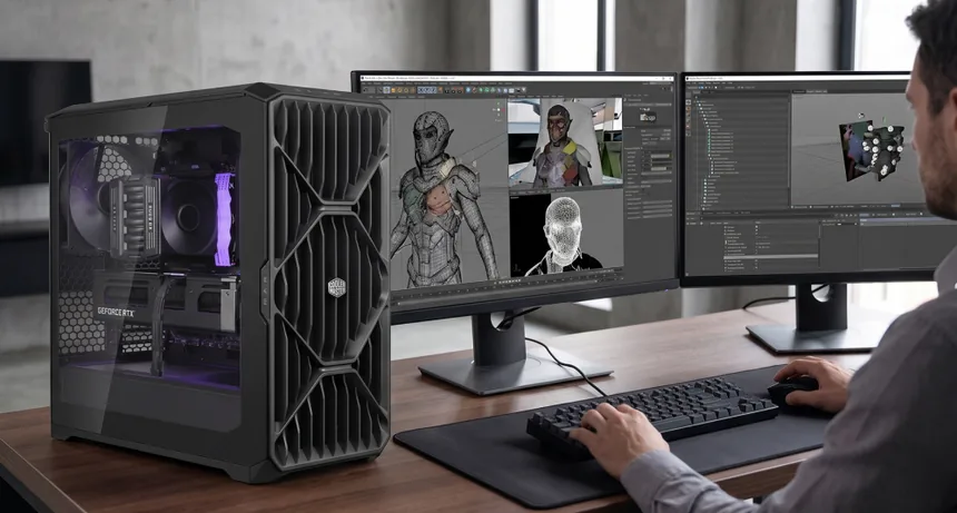 HAF II 500 workstation setup beside displays used for 3D design work